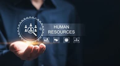 Hand holding different HR tools symbolizing AI HR tools