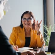 Monica Jain giving a review about CodSphere's web and mobile app development services